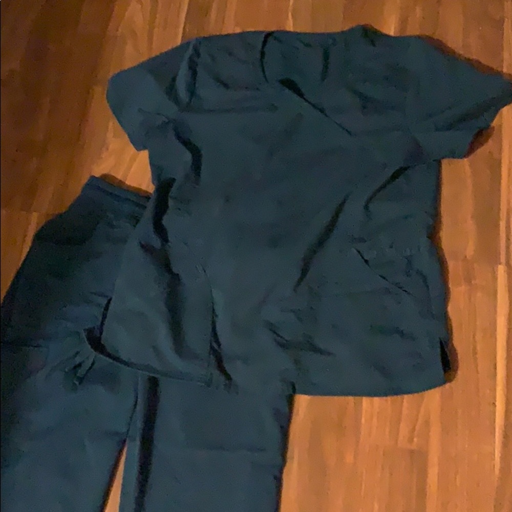 Used teal scrub set